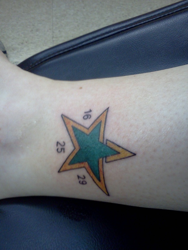 Dallas Cowboys star and skyline tattoo